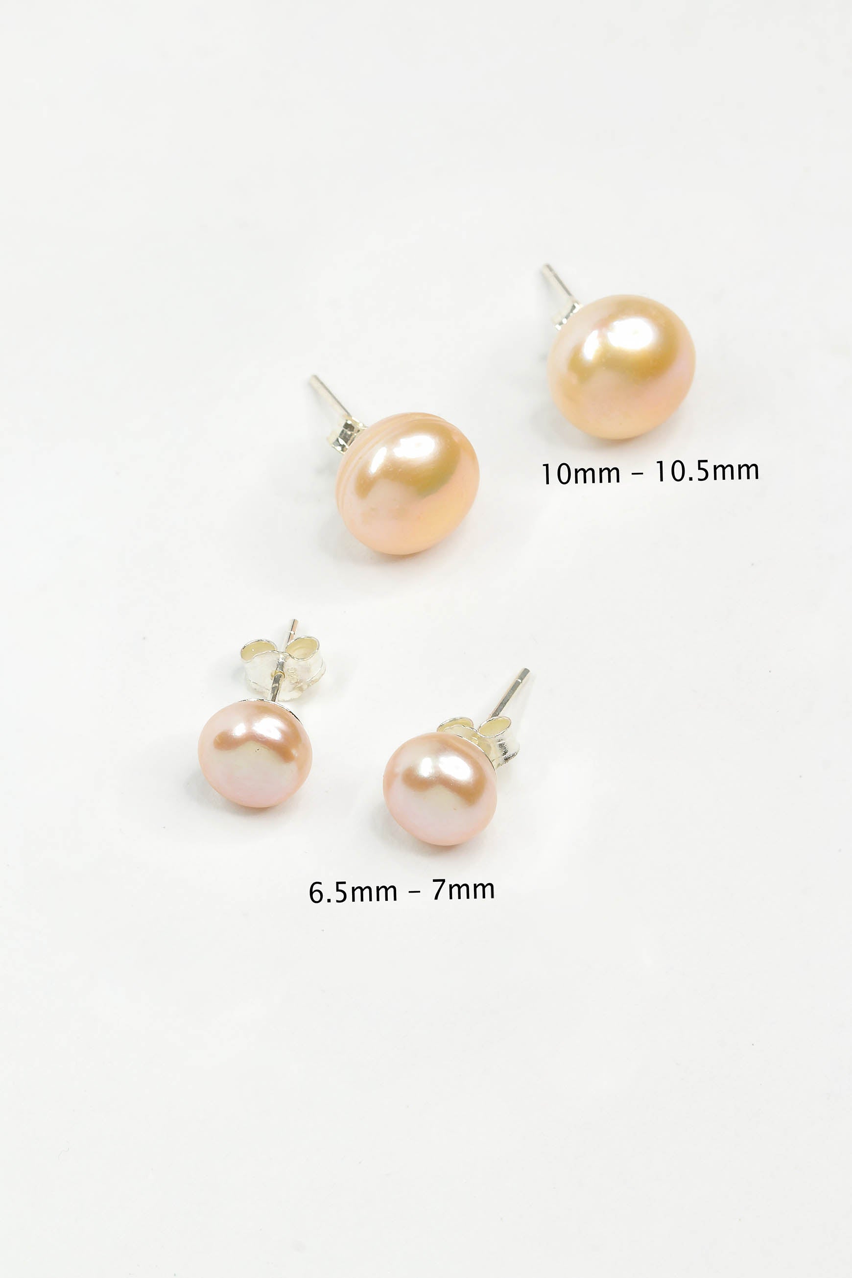 6.5mm-10mm light peach pearl studs